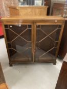 20th cent. Mahogany two door astragal glazed cabinet, moulded top on bracket feet. 48ins. x 48ins. x