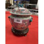 Chinese: Early 20th cent. Nyonya Straits porcelain covered jar decorated with poly chrome flowers on