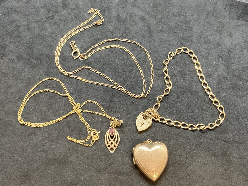 Hallmarked Jewellery: 9ct gold bracelet, pendant and chain, pendant set with a garnet and one chain.