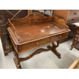 19th cent. Mahogany two drawer dressing table with raised gallery on vase shaped supports joined