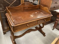 19th cent. Mahogany two drawer dressing table with raised gallery on vase shaped supports joined