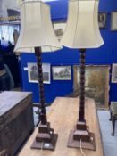 Early 20th cent. Oak lamps bobbin turned columns on square stepped bases 1 x 36ins. and 1 x 35ins.