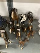 Pottery porcelain Beswick porcelain horses to include brown and white shire horse, black and white