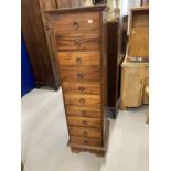 20th cent. Hardwood narrow ten drawer tall chest of drawers. 16ins. x 17ins. x 53ins.