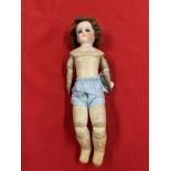 19th cent. Continental doll, porcelain head, kid leather jointed body, grey glass eyes, closed