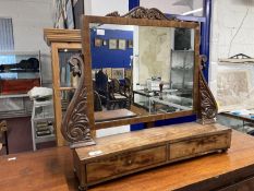 19th cent. Mahogany toilet mirror with carved shaped uprights on a concave two drawer base with