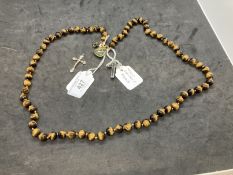 Jewellery: Necklet of (71) 10mm tiger's eye beads, length of necklet 34ins. Plus four pendants,