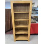 21st. cent. oak book shelf. 29½ins. x 68½ins. x 15½ins.