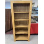 21st. cent. oak book shelf. 29½ins. x 68½ins. x 15½ins.