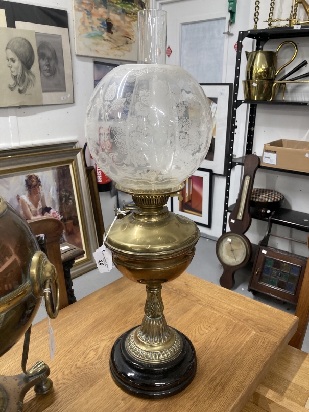 Early 20th cent. Brass oil lamp on a black porcelain mount, topped with a glass chimney and a - Image 3 of 3