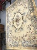 Carpets & Rugs: British made carpet, cream ground with floral decoration, ribbon and garland