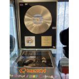 Pop Memorabilia: Queen replica Gold disc and limited official calendar for 1986, '87 and '88.