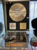 Pop Memorabilia: Queen replica Gold disc and limited official calendar for 1986, '87 and '88.