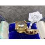 Hallmarked Jewellery: Two 9ct gold rings, one set with yellow quartz and one set with two garnets (