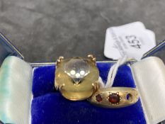 Hallmarked Jewellery: Two 9ct gold rings, one set with yellow quartz and one set with two garnets (