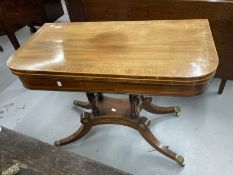 19th cent. Mahogany card table with boxwood inlay on four pillared supports with four splayed feet