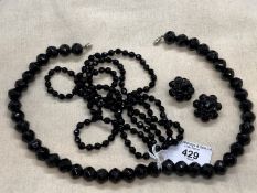 19th cent. Black glass jewellery, necklaces one with matching earrings. 18ins. and 40ins.