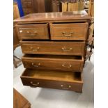 20th cent. Mahogany chest of two over four drawers with brass handles and bracket feet. 31ins. x