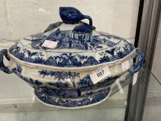 Chinese 18th cent. Blue and white porcelain shaped tureen and cover with a pomegranate handle to the