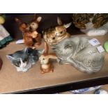 20th cent. Ceramics: Goebel, money box in the form of a sleeping grey cat, cuddling brown rabbits,