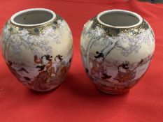 Oriental Ceramics: Two Japanese squat vases decorated with women and children in a rural scene, both