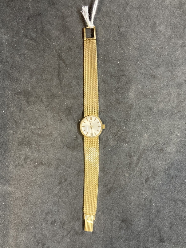 Watches: Ladies 18ct gold Omega bracelet watch, round silver coloured dial. Total weight 36.7g. - Image 2 of 3
