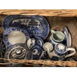 Pottery: Blue and white plates etc. Includes Willow pattern meat plate, Abbey ware tea caddy, etc.