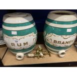 Breweriana: 19th cent. Ceramic barrels in mint green with gilt lettering Brandy and Rum, one with