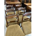 19th cent. Set of six Victorian upholstered mahogany dining chairs with sabre rear and turned