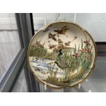 Japanese: Late 19th cent. Satsuma bowl with crimped edge the interior decorated with wading birds,