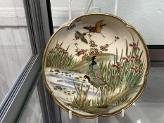 Japanese: Late 19th cent. Satsuma bowl with crimped edge the interior decorated with wading birds,