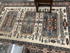 Carpets & Rugs: 19th cent. Caucasian carpet possibly Kazak. Ivory ground with three rectangular
