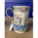 Late 18th cent. Staffordshire salt glazed mug, the slightly waisted form enamelled with flowering