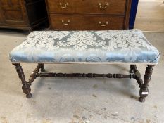 Early 20th cent. Footstool with turned legs joined by a turned stretcher. 40ins. x 18ins.