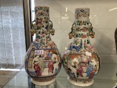 19th cent. Cantonese Famille Rose bulbous vase with narrow neck, two panels with figures, floriate