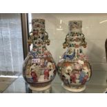 19th cent. Cantonese Famille Rose bulbous vase with narrow neck, two panels with figures, floriate