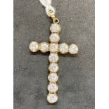 Hallmarked Jewellery: 9ct gold cross 1¾ins. x 1ins. Set with twelve cubic zirconia, hallmarked