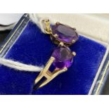 Jewellery: Ring yellow metal set with an oval cut amethyst, estimated weight 2.50ct, tests as 14ct