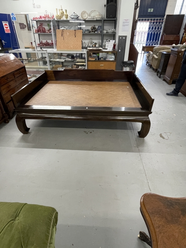 Chinese large hardwood bed with rattan covered base. 81ins. x 59ins.
