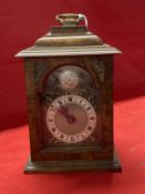 Clocks: 20th cent. Walnut bracket clock by Mercer with caddy top and brass carrying handle. 8ins.