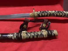 Weapons: Replica Samurai sword 440 stainless steel blade in black and gilt lacquer case.