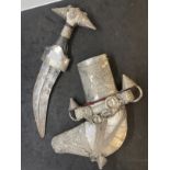 Edged Weapons: 20th cent. Omani Khanjar/Jambiya dagger with curved blade and white metal decorated