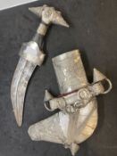 Edged Weapons: 20th cent. Omani Khanjar/Jambiya dagger with curved blade and white metal decorated