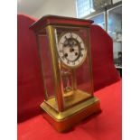 Clocks: 19th cent. Four glass mantle clock retailed by J.W. Benson with visible escapement and