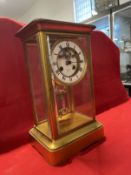 Clocks: 19th cent. Four glass mantle clock retailed by J.W. Benson with visible escapement and