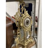 Clocks: 20th cent. Gilt metal clock in the French style.