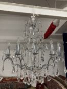 20th cent. Chromed glass twelve lamp chandelier.