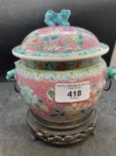 Chinese: Early 20th cent. Nyonya Straits porcelain covered jar decorated with poly chrome flowers on