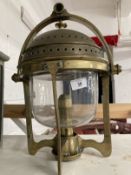 Nautical: Brass marine hanging light stamped Ratcliff, small chip to glass dome. 10ins.