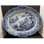 Late 18th cent. Chinese blue and white plate decorated with figures in a landscape with pagodas.